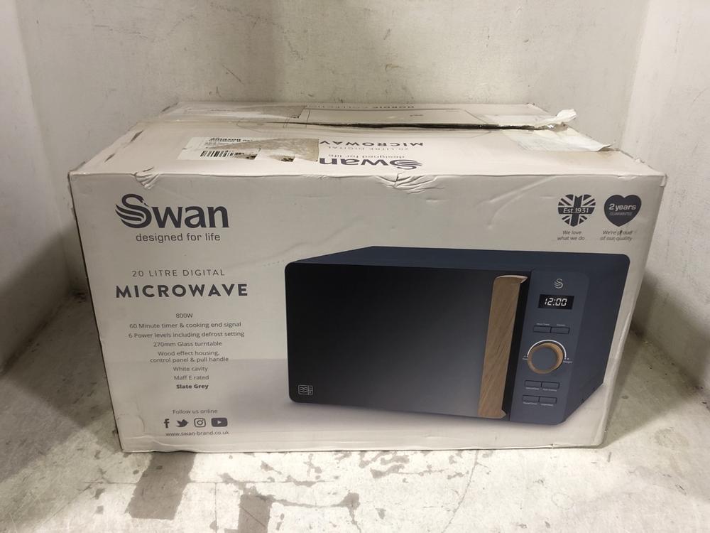 Lot 618  
            Chesterfield SR45 - Parcel Delivery Only 

                
SWAN 20 LITRE DIGITAL MICROWAVE NORDIC COLLECTION (LOCATION: E5)