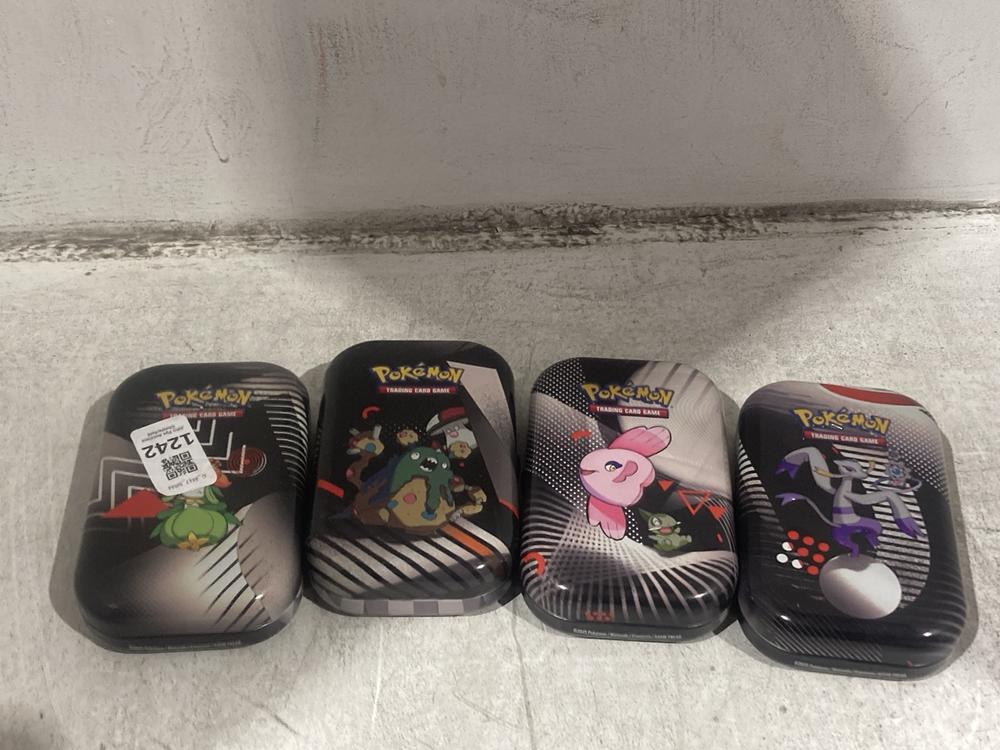 Lot 1242  
            Chesterfield SR44 - Parcel Delivery Only 

                
4 X ASSORTED POKEMON TINS TO INCLUDE POKEMON TCG UNOVA MINI TIN (LOCATION: C7)