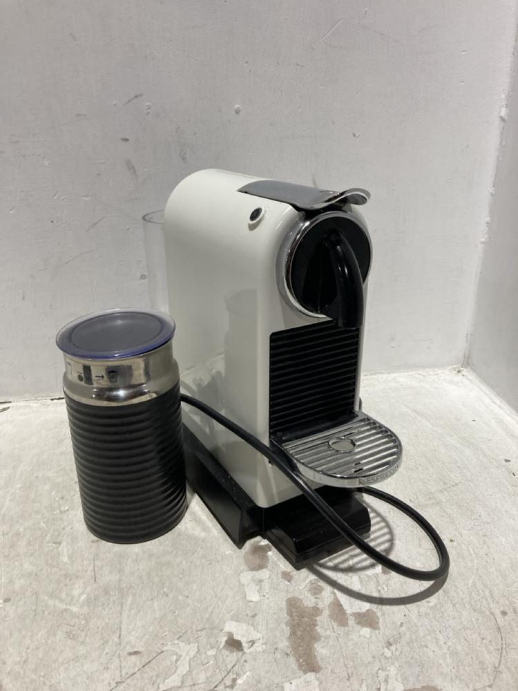 Lot 1547  
            Chesterfield SR44 - Parcel Delivery Only 

                
MAGIMIX CITIZ AND MILK COFFEE MACHINE IN WHITE (LOCATION: B8)