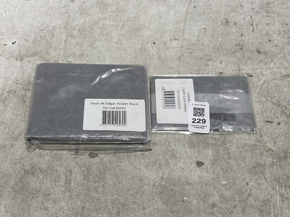 Lot 229  
            Chesterfield SR44 - Parcel Delivery Only 

                
SWAN & EDGAR WALLET BLACK TO INCLUDE GAMAGES CREDIT CARD HOLDER (LOCATION: B1)