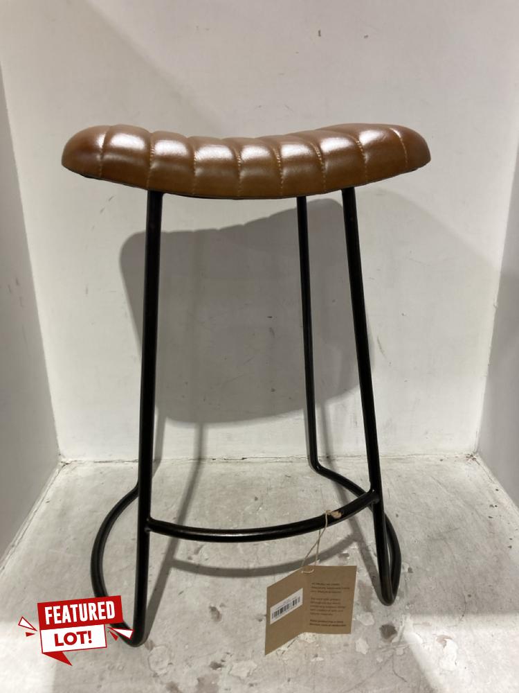 Lot 50  
            Chesterfield SR44 - Parcel Delivery Only 

                
NKUKU RIBBED LEATHER STOOL - AGED TAN - SMALL - ITEM NO. NS1101 - ORIGINAL RRP £2...