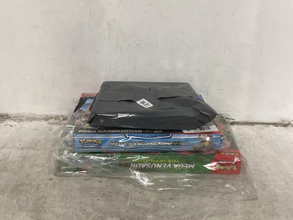 Lot 706  
            Chesterfield SR44 - Parcel Delivery Only 

                
3 X ASSORTED POKEMON ITEMS TO INCLUDE MEGA KANGASKHAN PREMIUM COLLECTION (LOCATIO...
