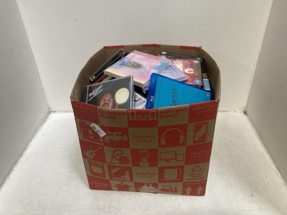 Lot 324  
            Chesterfield SR46 - Parcel Delivery Only 

                
QTY OF ASSORTED CDS & DVDS TO INCLUDE BOB SEGER NIGHT MOVES THE SILVER BULLET BAN...