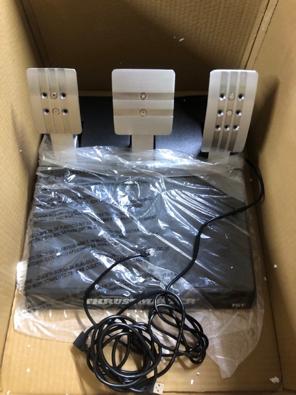 Lot 11  
            Nottingham SR1 - Delivery Only 

                
PLAYSTATION THRUSTMASTER T-GTII GAMING WHEEL AND PEDALS - BLACK - ORIGINAL RRP - ...