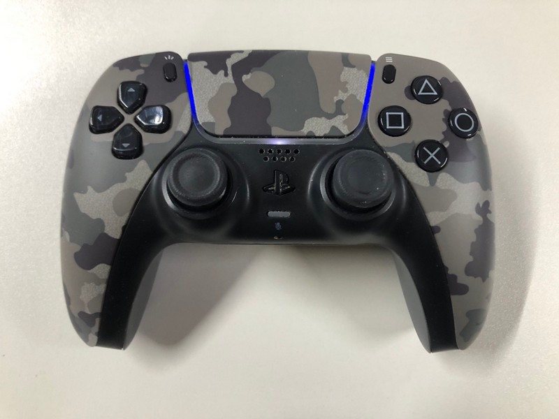 Lot 46  
            Nottingham SR1 - Delivery Only 

                
PLAYSTATION 5 DUAL SENSE WIRELESS CONTROLLER - GREY CAMO - ORIGINAL RRP - £74.99