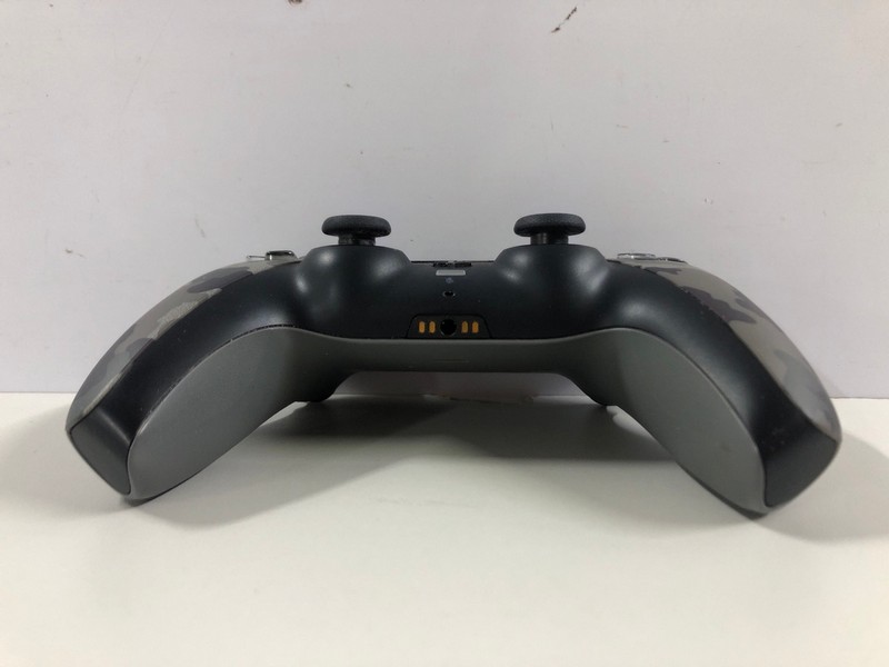 Lot 47  
            Nottingham SR1 - Delivery Only 

                
PLAYSTATION 5 DUAL SENSE WIRELESS CONTROLLER - GREY CAMO - ORIGINAL RRP - £74.99