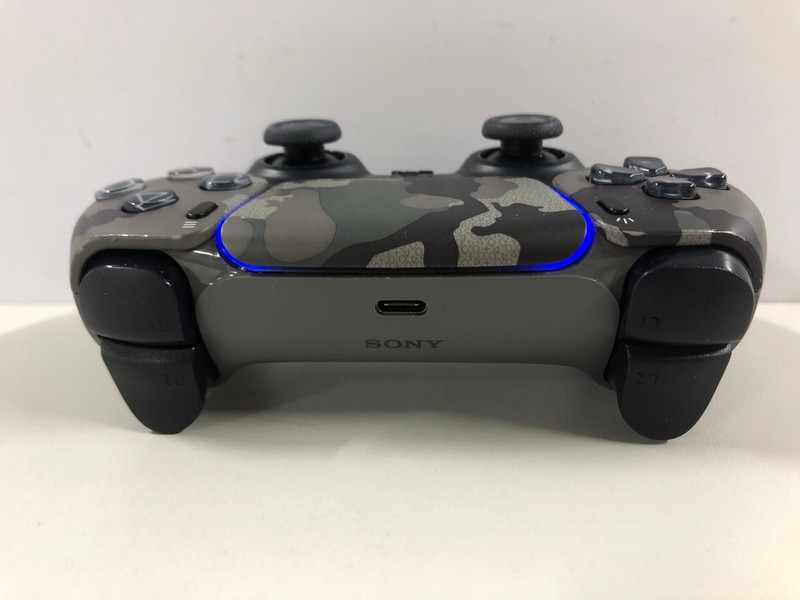 Lot 48  
            Nottingham SR1 - Delivery Only 

                
PLAYSTATION 5 DUAL SENSE WIRELESS CONTROLLER - GREY CAMO - ORIGINAL RRP - £74.99