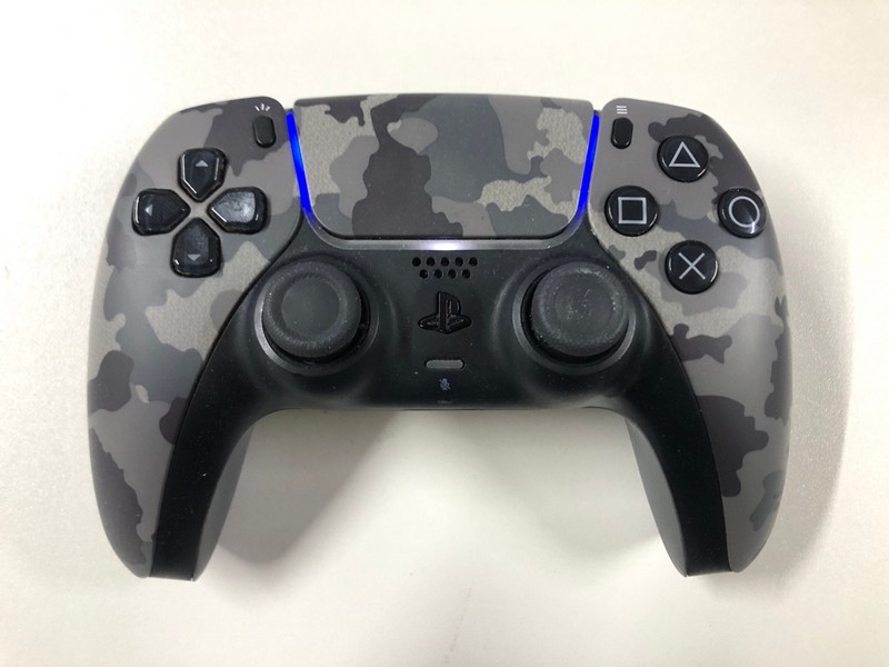Lot 50  
            Nottingham SR1 - Delivery Only 

                
PLAYSTATION 5 DUAL SENSE WIRELESS CONTROLLER - GREY CAMO - ORIGINAL RRP - £74.99