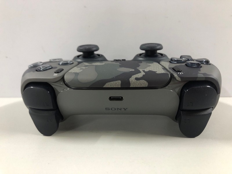 Lot 51  
            Nottingham SR1 - Delivery Only 

                
PLAYSTATION 5 DUAL SENSE WIRELESS CONTROLLER - GREY CAMO - ORIGINAL RRP - £74.99