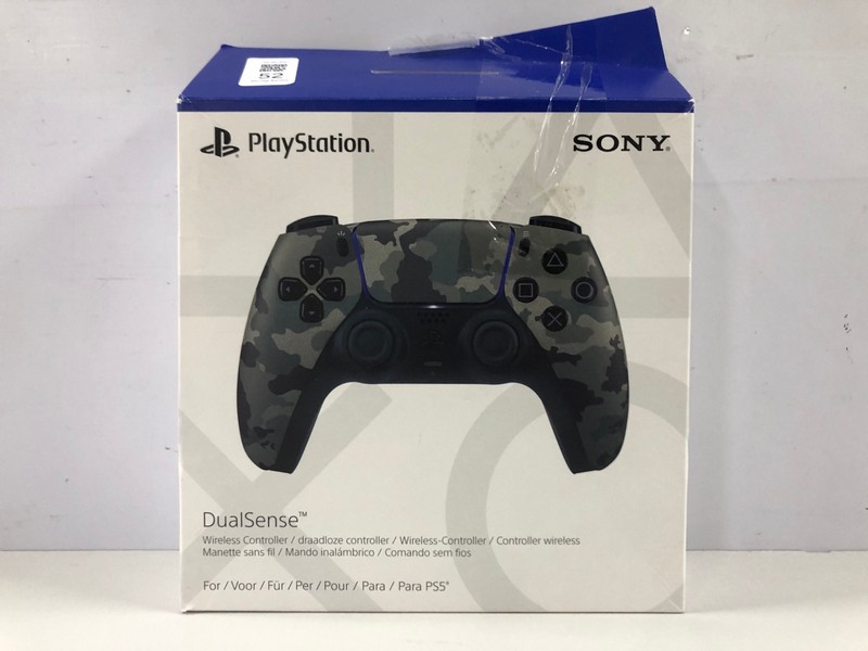 Lot 52  
            Nottingham SR1 - Delivery Only 

                
PLAYSTATION 5 DUAL SENSE WIRELESS CONTROLLER - GREY CAMO - ORIGINAL RRP - £74.99