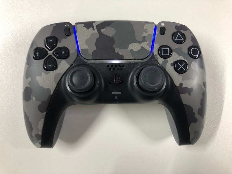 Lot 52  
            Nottingham SR1 - Delivery Only 

                
PLAYSTATION 5 DUAL SENSE WIRELESS CONTROLLER - GREY CAMO - ORIGINAL RRP - £74.99