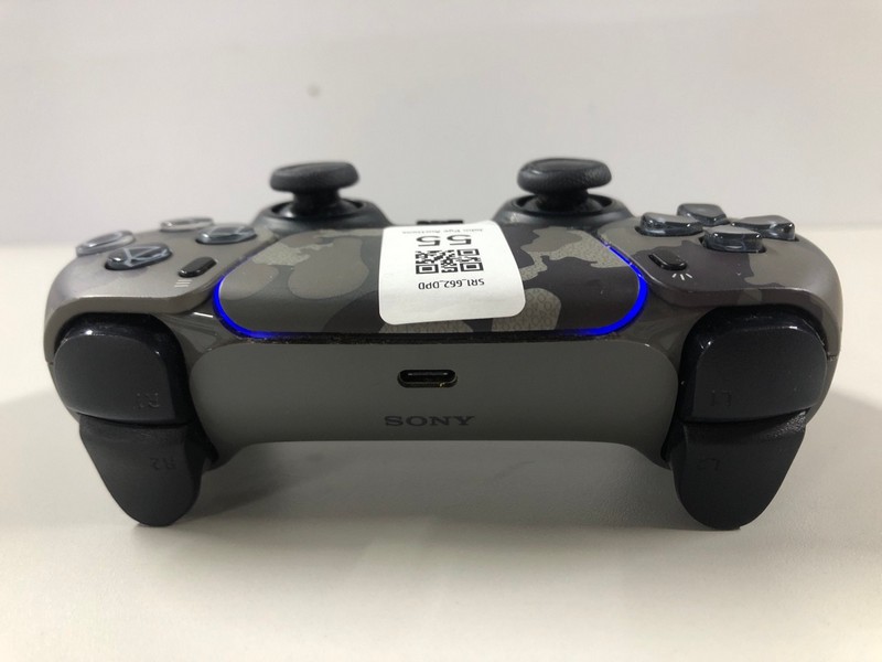 Lot 55  
            Nottingham SR1 - Delivery Only 

                
PLAYSTATION 5 DUAL SENSE WIRELESS CONTROLLER - GREY CAMO - ORIGINAL RRP - £74.99