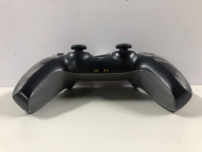 Lot 57  
            Nottingham SR1 - Delivery Only 

                
PLAYSTATION 5 DUAL SENSE WIRELESS CONTROLLER - GREY CAMO - ORIGINAL RRP - £74.99