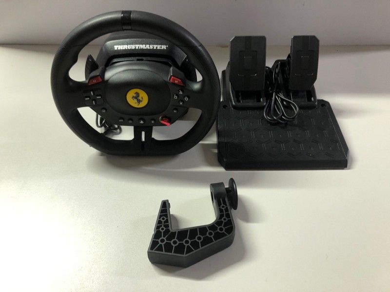 Lot 580  
            Nottingham SR1 - Delivery Only 

                
THRUSTMASTER T98 FERRARI 296 GTS RACING WHEEL (PLAYSTATION) - ORIGINAL RRP.£89