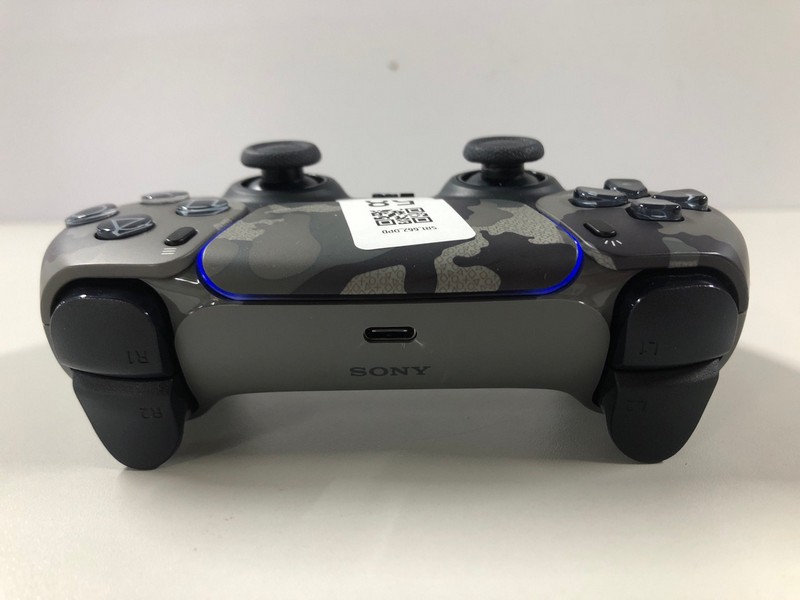 Lot 58  
            Nottingham SR1 - Delivery Only 

                
PLAYSTATION 5 DUAL SENSE WIRELESS CONTROLLER - GREY CAMO - ORIGINAL RRP - £74.99