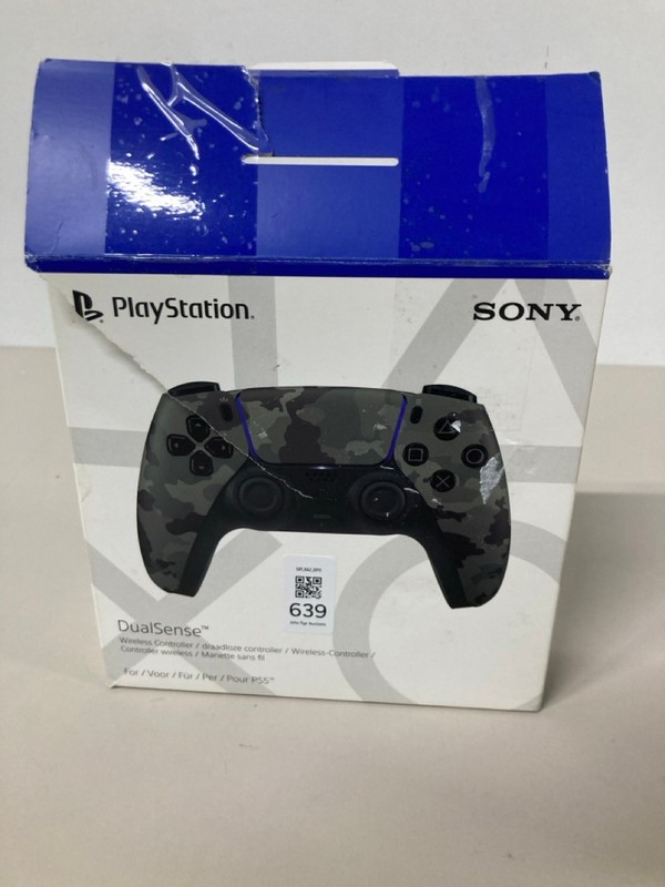 Lot 639  
            Nottingham SR1 - Delivery Only 

                
PLAYSTATION 5 DUAL SENSE WIRELESS CONTROLLER - GREY CAMO - ORIGINAL RRP - £74.99
