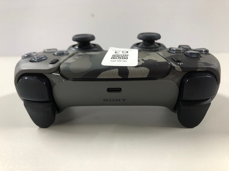 Lot 63  
            Nottingham SR1 - Delivery Only 

                
PLAYSTATION 5 DUAL SENSE WIRELESS CONTROLLER - GREY CAMO - ORIGINAL RRP - £74.99