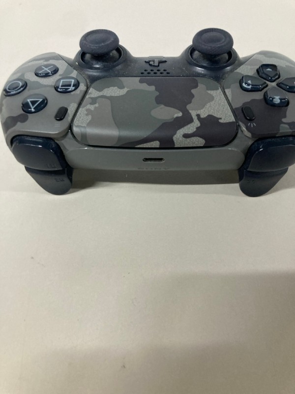 Lot 640  
            Nottingham SR1 - Delivery Only 

                
PLAYSTATION 5 DUAL SENSE WIRELESS CONTROLLER - GREY CAMO - ORIGINAL RRP - £74.99