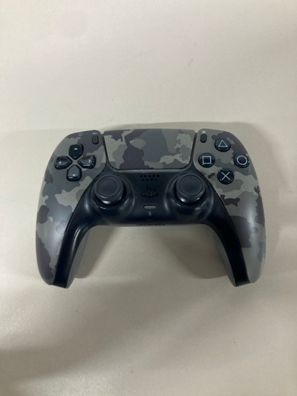 Lot 641  
            Nottingham SR1 - Delivery Only 

                
PLAYSTATION 5 DUAL SENSE WIRELESS CONTROLLER - GREY CAMO - ORIGINAL RRP - £74.99