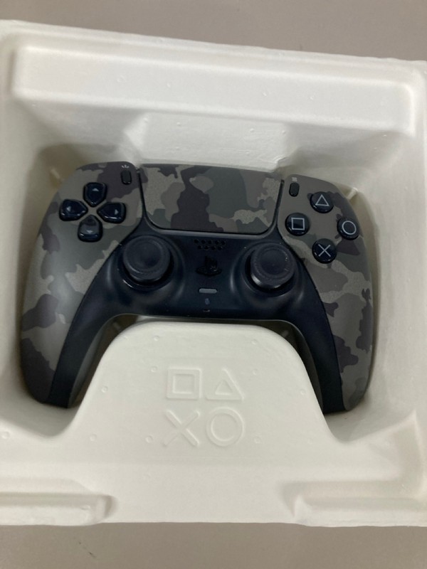 Lot 644  
            Nottingham SR1 - Delivery Only 

                
PLAYSTATION 5 DUAL SENSE WIRELESS CONTROLLER - GREY CAMO - ORIGINAL RRP - £74.99