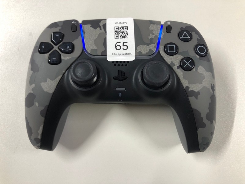Lot 65  
            Nottingham SR1 - Delivery Only 

                
PLAYSTATION 5 DUAL SENSE WIRELESS CONTROLLER - GREY CAMO - ORIGINAL RRP - £74.99