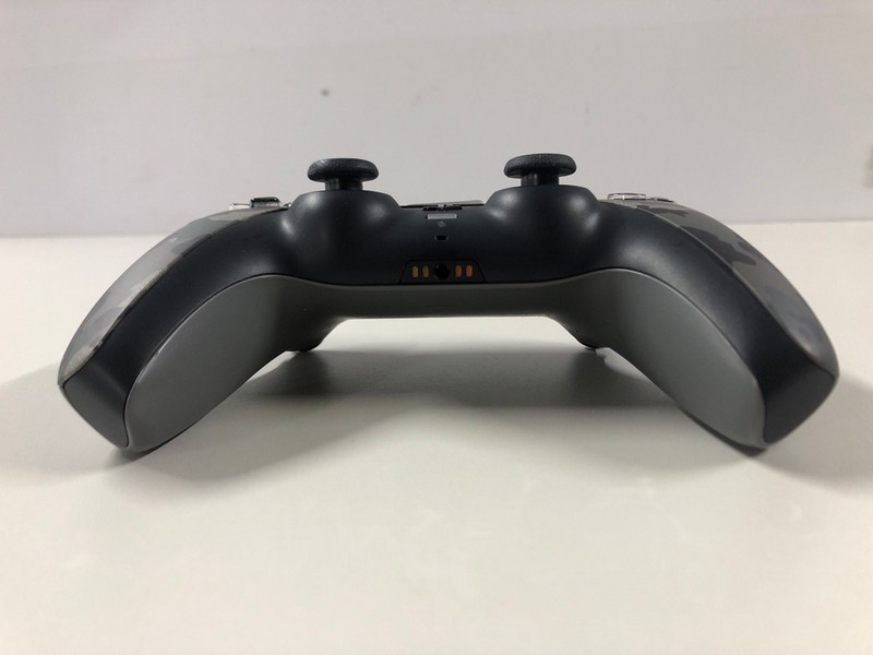 Lot 65  
            Nottingham SR1 - Delivery Only 

                
PLAYSTATION 5 DUAL SENSE WIRELESS CONTROLLER - GREY CAMO - ORIGINAL RRP - £74.99