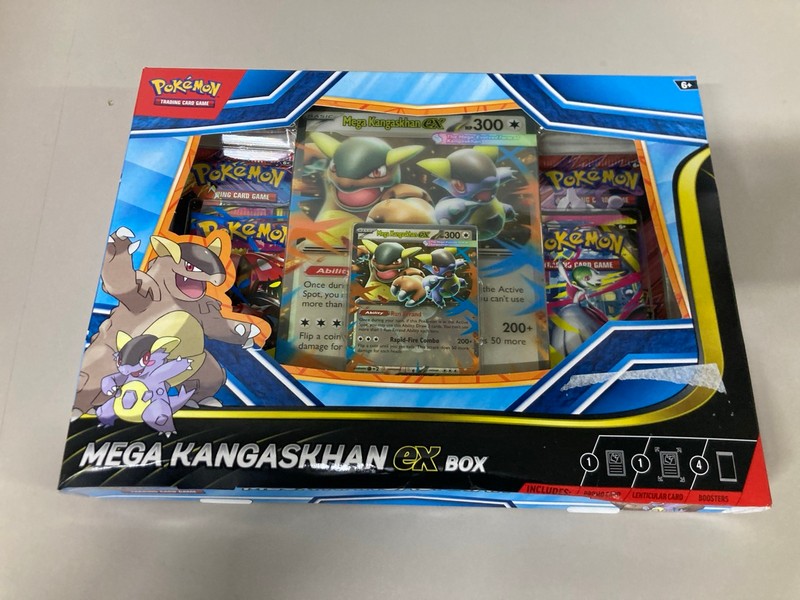 Lot 669  
            Nottingham SR1 - Delivery Only 

                
4 X POKÉMON CARD TINS/BOX SETS INC. MEGA KANGASKHAN EX BOX