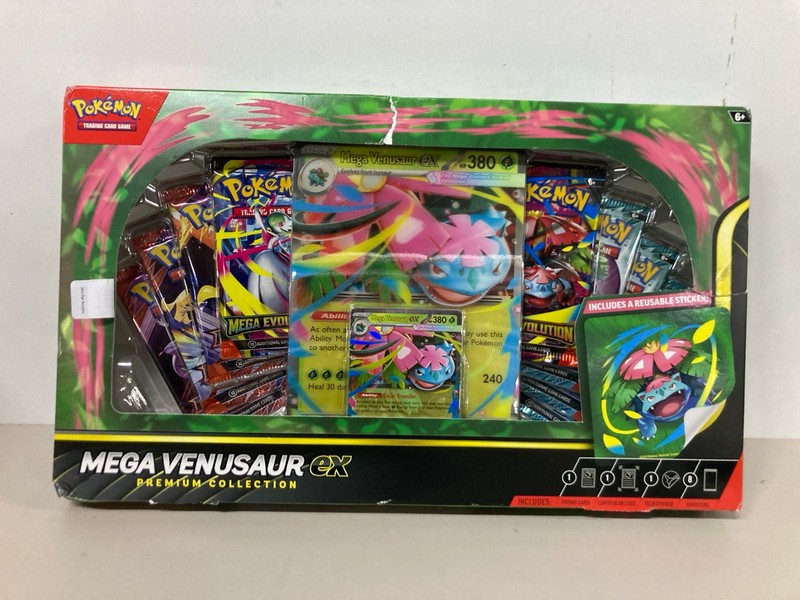 Lot 669  
            Nottingham SR1 - Delivery Only 

                
4 X POKÉMON CARD TINS/BOX SETS INC. MEGA KANGASKHAN EX BOX