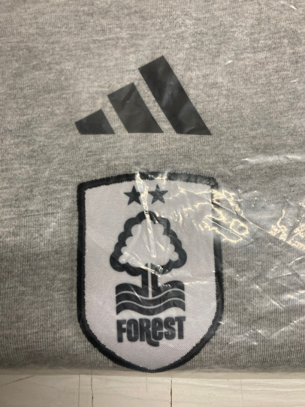 Lot 436  
            Nottingham SR3 - Delivery Only 

                
ADIDAS NOTTINGHAM FOREST CREW NECK IN GREY SIZE 2XL - Image 4
