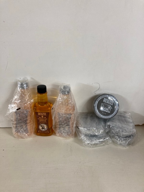 Lot 246  
            Nottingham SR5 - Delivery Only 

                
QTY OF REUZEL ITEMS TO INC EXTREME HOLD MATTE