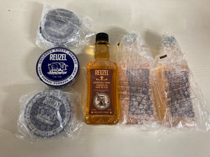 Lot 278  
            Nottingham SR5 - Delivery Only 

                
BOX OF VARIOUS REUZEL ITEMS TO INC REUZEL GROOMING TONIC