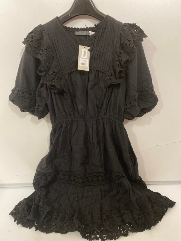 Lot 285  
            Nottingham SR7 – Delivery Only 

                
MINT VELVET BLACK LACE RUFFLE MINI DRESS SIZE: UK 14