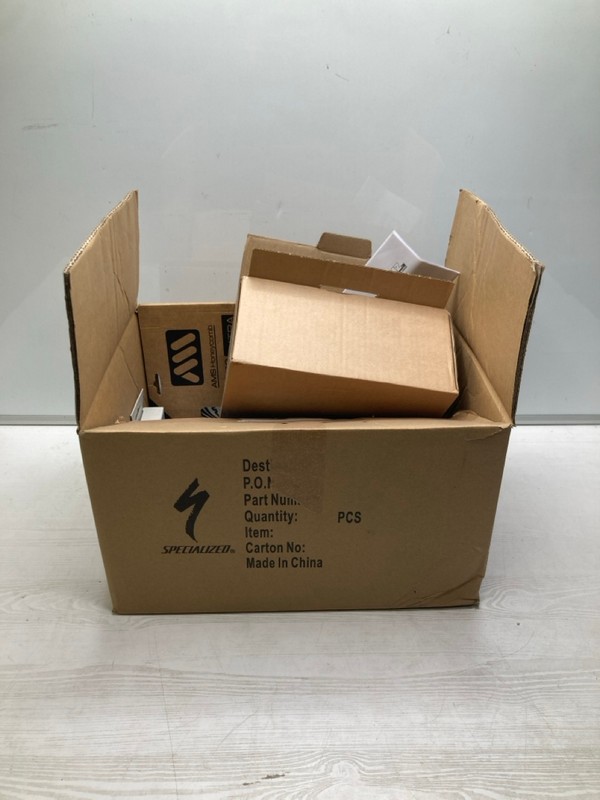Lot 320  
            Nottingham SR9 - Delivery Only 

                
BOX OF ASSORTED BICYCLE ITEMS INC SHIMANO DISC BRAKE MOUNT ADAPTER