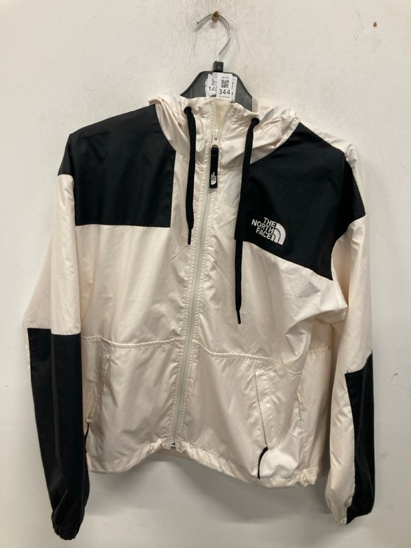 Lot 344  
            Nottingham SR9 - Delivery Only 

                
WOMENS THE NORTH FACE WHITE/BLACK WINDBREAKER JACKET UK SIZE S