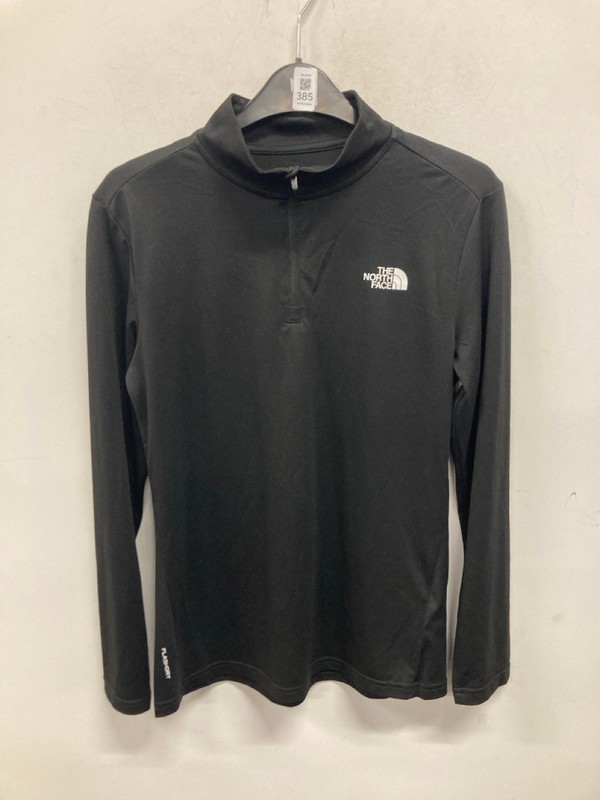 Lot 385  
            Nottingham SR9 - Delivery Only 

                
WOMENS THE NORTH FACE BLACK 1/4 ZIP DRI-FIT JACKET UK SIZE S