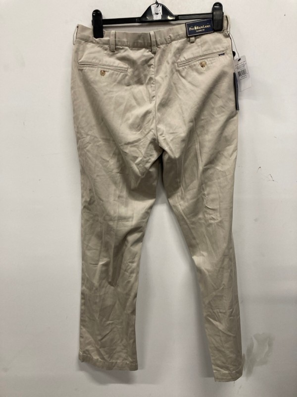 Lot 479  
            Nottingham SR9 - Delivery Only 

                
RALPH LAUREN GREENWICH CHINO CLASSIC STONE TROUSERS UK SIZE 36/32 - Image 3