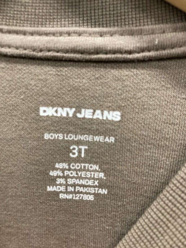 Lot 525  
            Nottingham SR9 - Delivery Only 

                
KIDS DKNY JEANS BROWN CREW NECK JUMPER UK SIZE 3T - Image 2