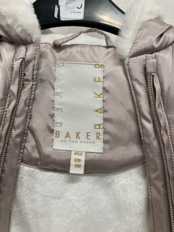 Lot 535  
            Nottingham SR9 - Delivery Only 

                
KIDS TED BAKER PINK COAT ONESIE WITH MITTENS UK SIZE 6-9 MONTHS - Image 2