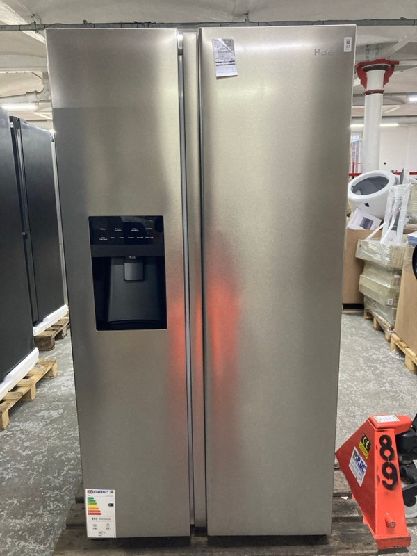 Lot 87  
            Nottingham SR1 - Delivery or Collection 

                
HAIER SBS 90 SERIES 5 AMERICAN FRIDGE FREEZER MODEL: HSR5918DIMP - ORIGINAL RRP.£999