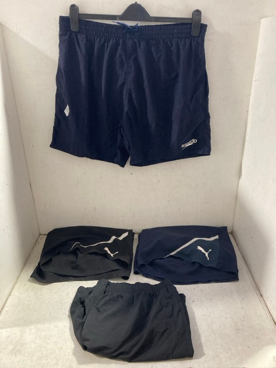 Lot 1013  
            Marchington SR15 - Parcel Delivery Only 

                
4X MENS SWIMMING TRUNK SHORTS TO INCLUDE SPEEDO SIZE XL: LOCATION - BR1