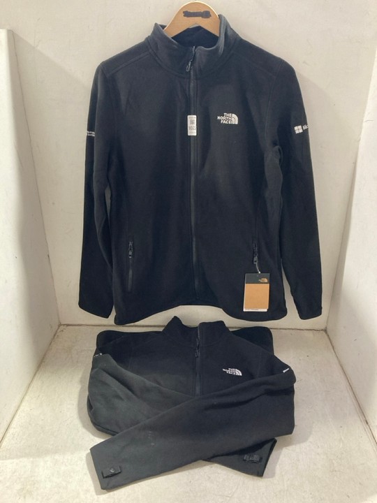 Lot 1022  
            Marchington SR15 - Parcel Delivery Only 

                
2 X NORTH FACE WOMENS FLEECES IN BLACK SIZES: L/XL: LOCATION - BR1
