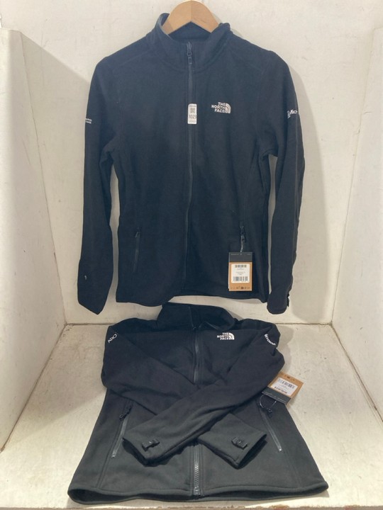 Lot 1023  
            Marchington SR15 - Parcel Delivery Only 

                
2 X NORTH FACE WOMENS FLEECES IN BLACK SIZES: M/L: LOCATION - BR1