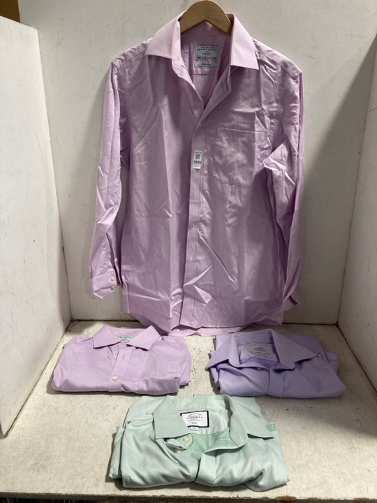 Lot 1049  
            Marchington SR15 - Parcel Delivery Only 

                
4 X ASSORTED CHARLES TYRWHITT SHIRTS TO INCLUDE SHIRT IN PURPLE - SIZE 15/33": LO...