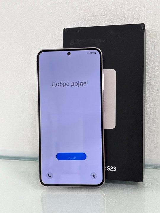 Lot 128  
            Nationwide - Parcel Delivery Only 

                
SAMSUNG GALAXY S23 SMARTPHONE IN LAVENDER: MODEL NO SM-S911B/DS (WITH BOX & CHARG...