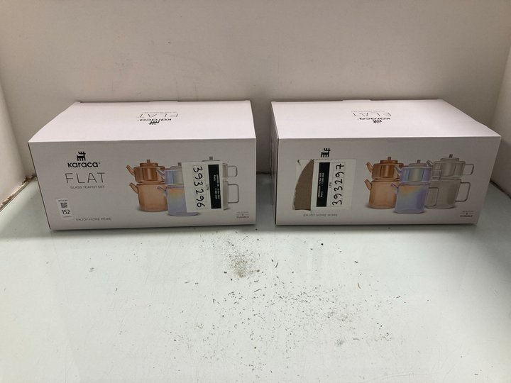 Lot 152  
            Marchington SR14 - Parcel Delivery Only 

                
2 X KARACA FLAT GLASS TEAPOT SETS: LOCATION - A4