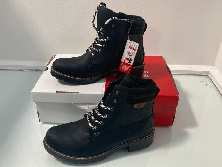 Lot 1535  
            Marchington SR14 - Parcel Delivery Only 

                
RIEKER LACE-UP BOOTS IN BLACK - UK 4: LOCATION - D4