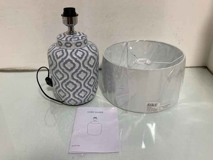 Lot 205  
            Marchington SR14 - Parcel Delivery Only 

                
CELIA GREY AND WHITE PATTERN CERAMIC TABLE LAMP - ORIGINAL RRP £110: LOCATION - A6