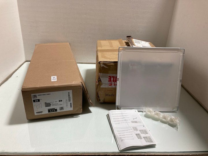 Lot 260  
            Marchington SR14 - Parcel Delivery Only 

                
DECORTIE SIMPI SIDE TABLE TO INCLUDE STORAGE CUBE SHELVING IN WHITE: LOCATION - A9