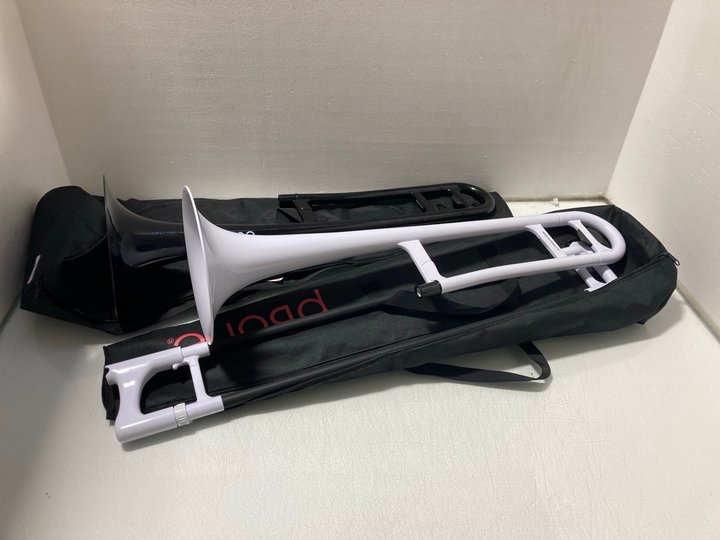 Lot 279  
            Marchington SR14 - Parcel Delivery Only 

                
2 X JIGGS P BONE PLASTIC TROMBONES IN BLACK & WHITE - COMBINED ORIGINAL RRP £300:...
