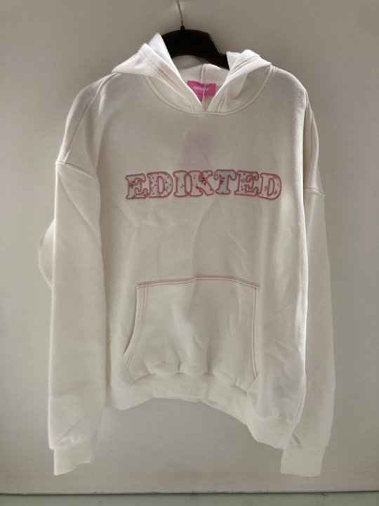 Lot 330  
            Marchington SR14 - Parcel Delivery Only 

                
EDIKTED FLORAL LOGO HOODIE IN WHITE - UK MEDIUM: LOCATION - A13